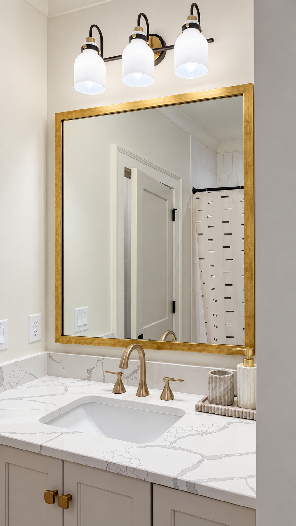 The Clubhouse Suite bathroom sink and mirror