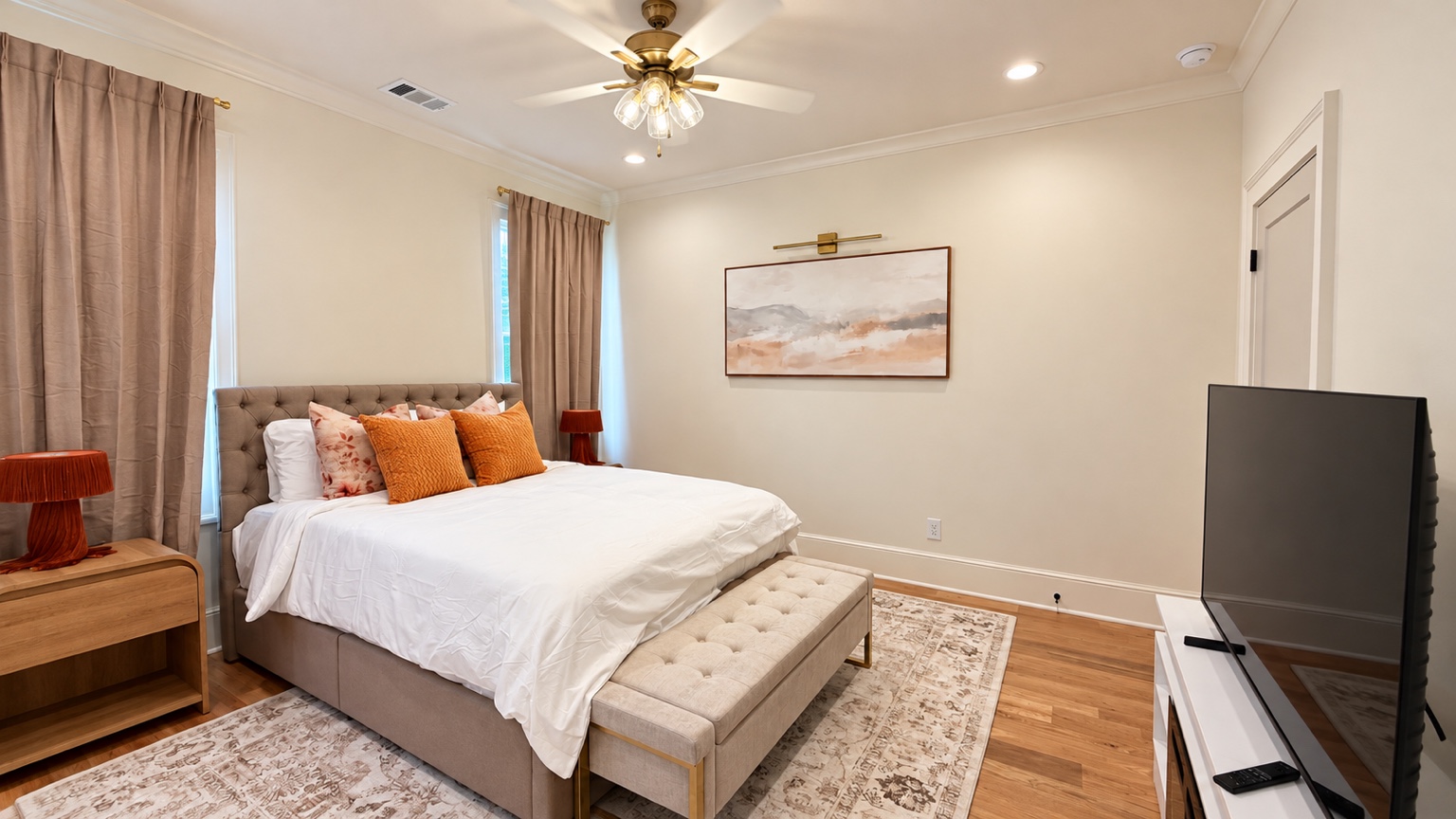 The Georgia Peach bedroom with queen bed and television