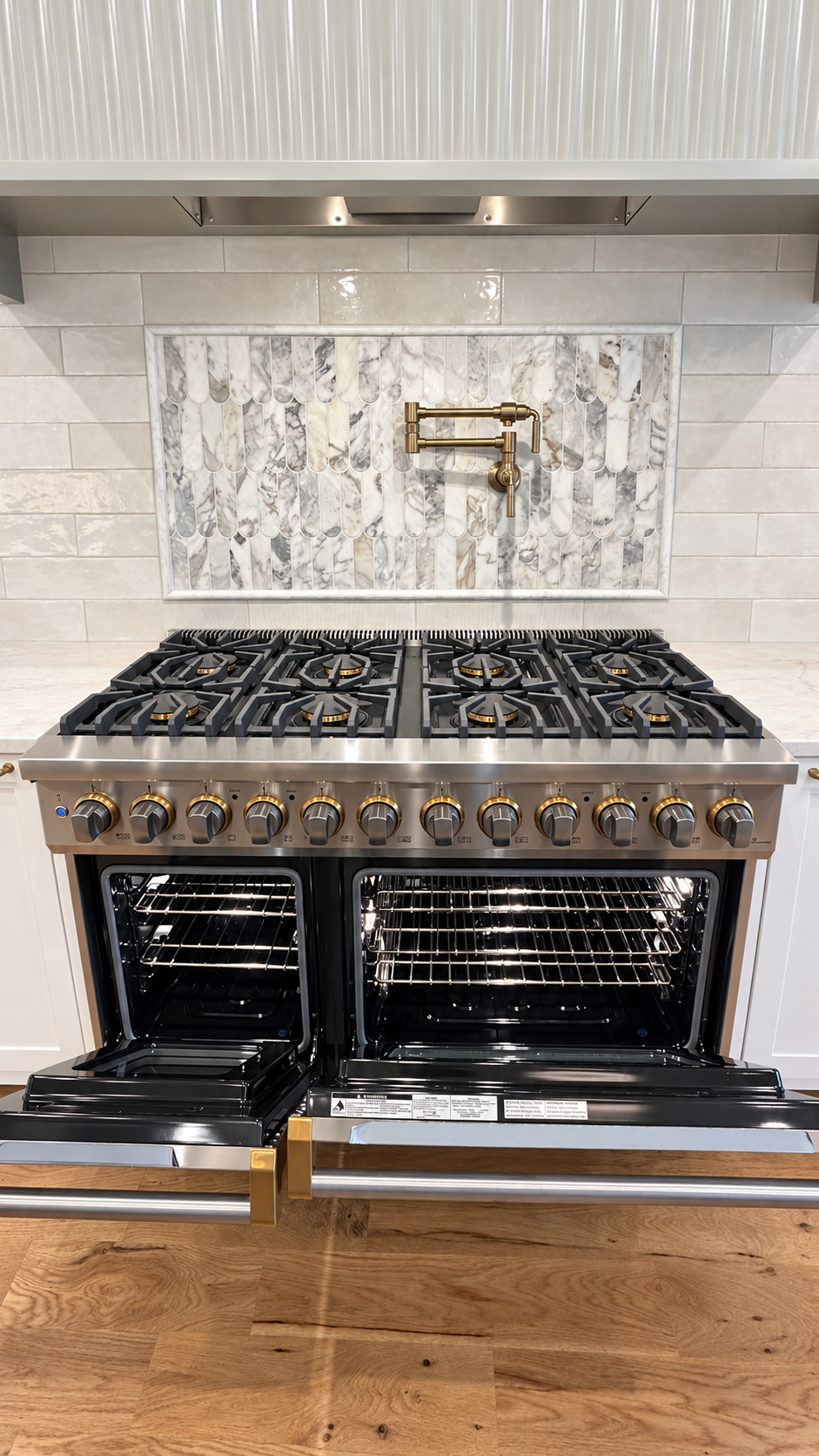 Viking eight-burner range with dual ovens and brass pot filler