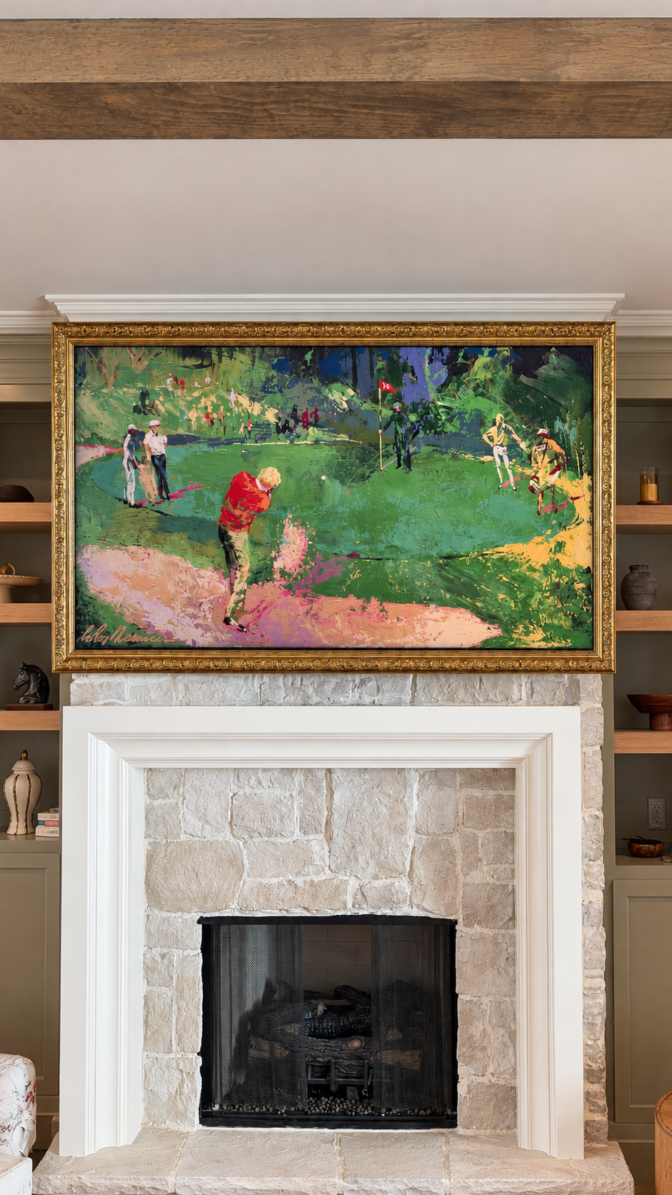 Living room fireplace with framed golf artwork
