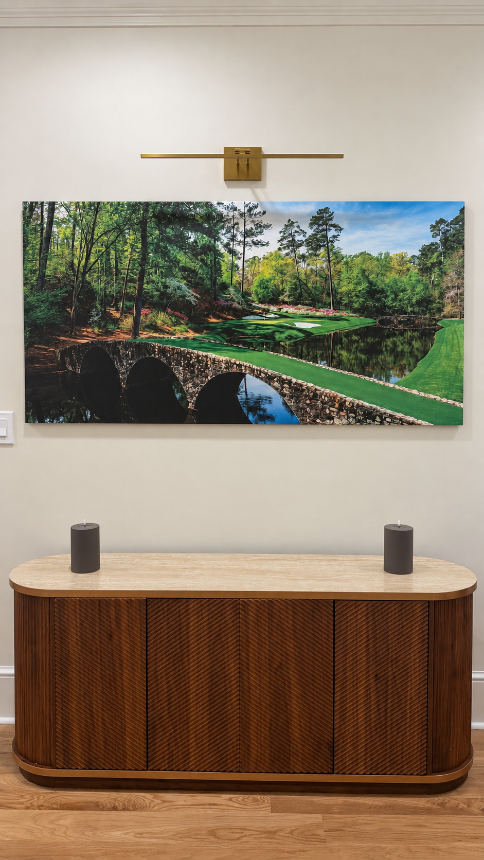Golf artwork above a wood console