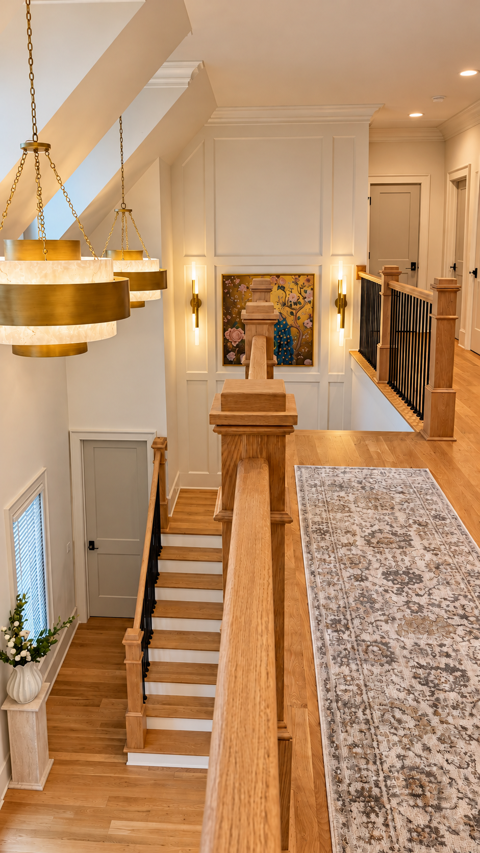 Upper landing, staircase and chandelier lighting